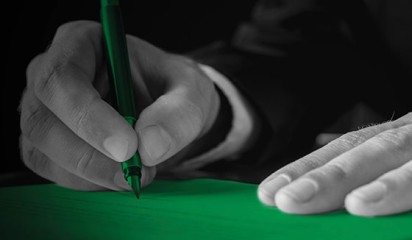 Signing paper 1600x1000THUMBMAIL