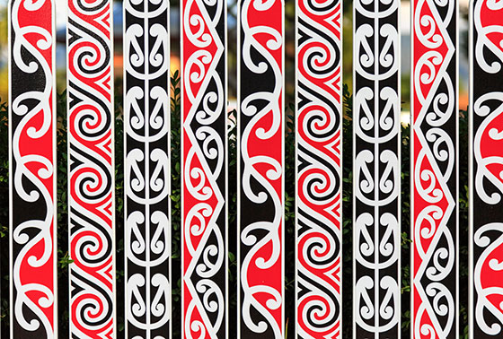 maori patterns on a fence thumb2